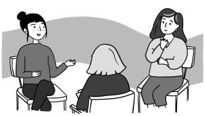 A mediator sits between two people