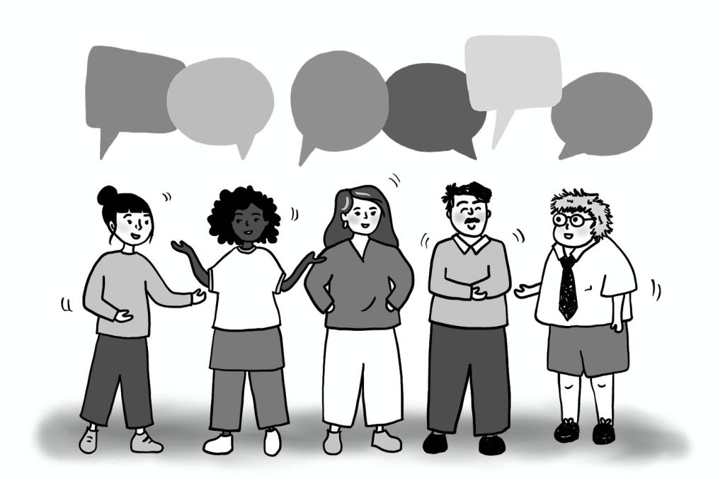 A group of people stand chatting amongst themselves